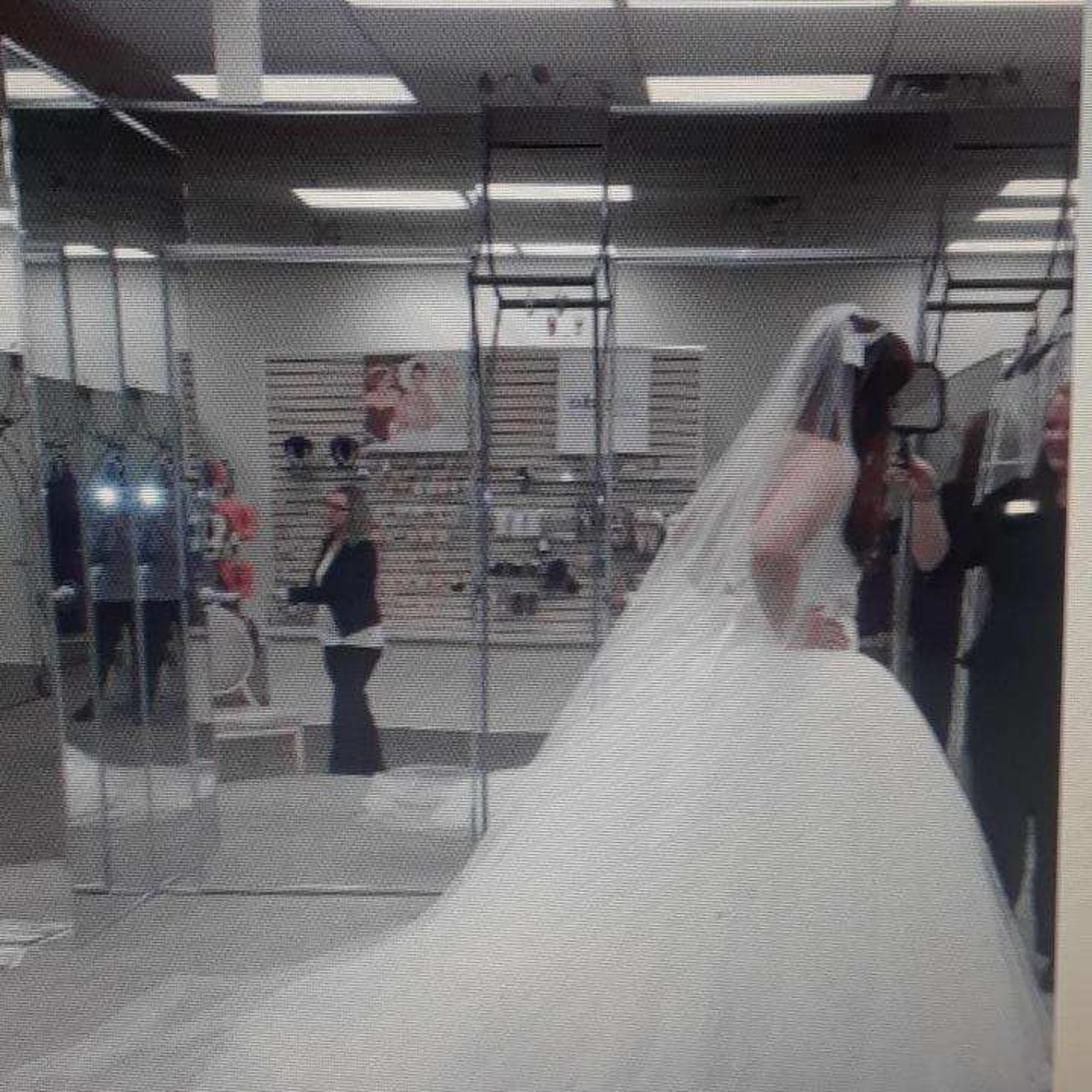 Comes with cathedral veil and Swarovski belt